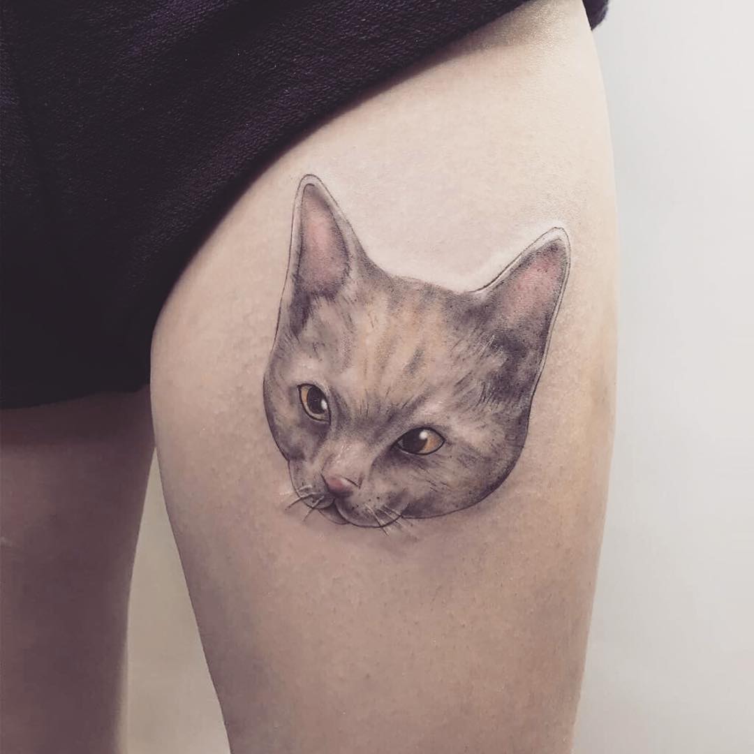 邴小姐大腿猫咪纹身图案